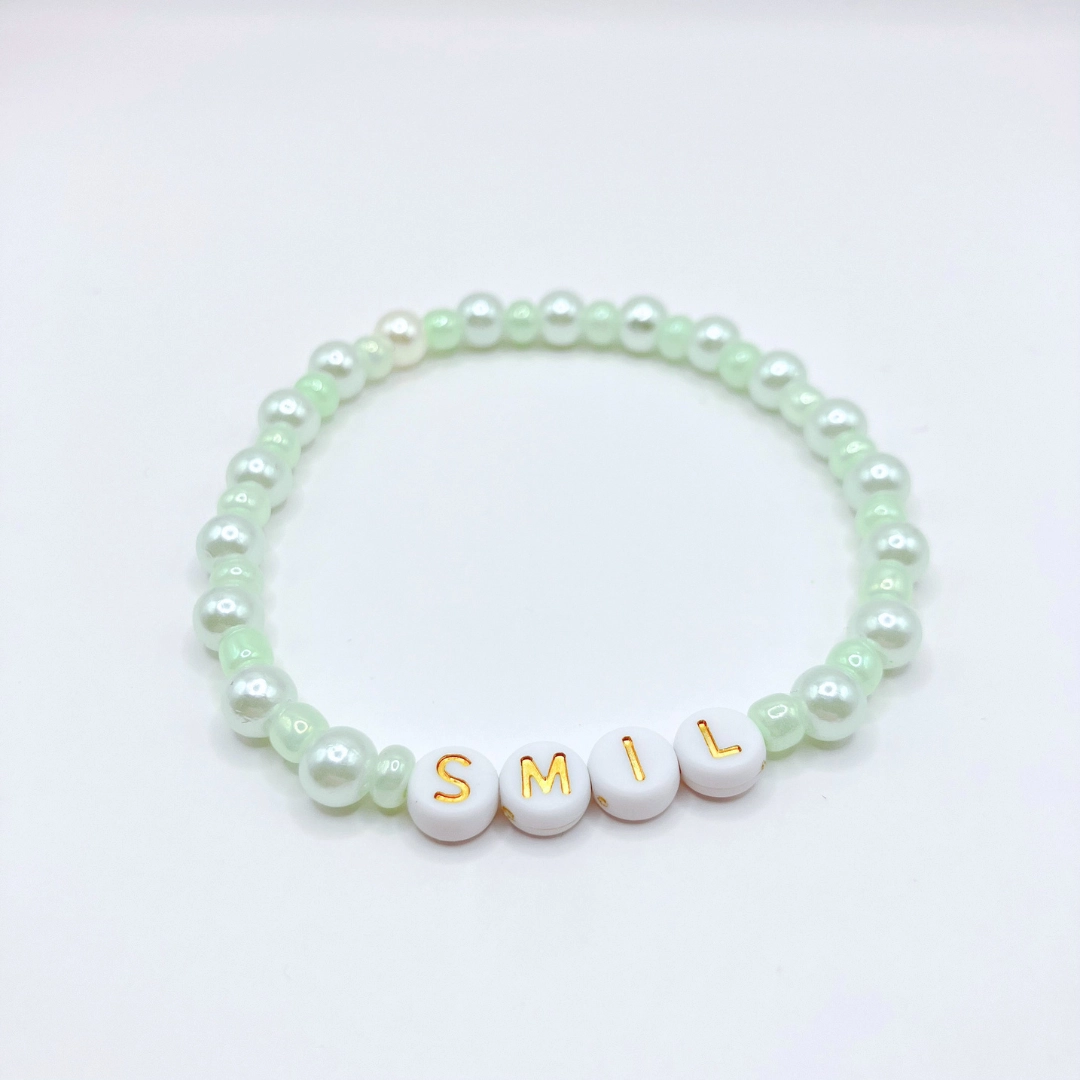 Smil-armbånd