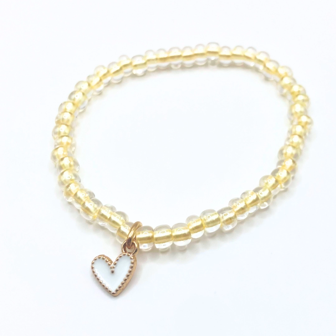 Beige med hvit charm - barn